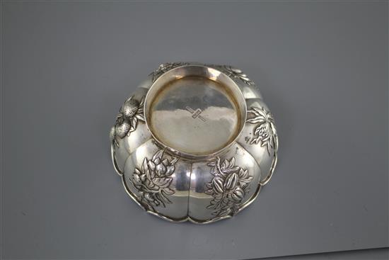 A late 19th/early 20th century Chinese Export white metal bowl, by Zee Wo, decorated with various fruit and flowers, 11.4cm, 5.5oz.